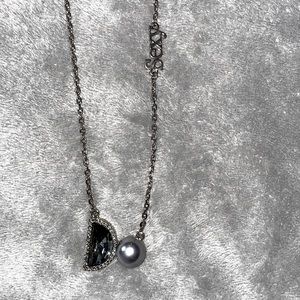 Beautiful and sexy necklace as it says on the side.